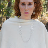 Handmade hammered large oval links held together with delicate sterling silver barrel tube chain to form long necklace that can be worn at any length