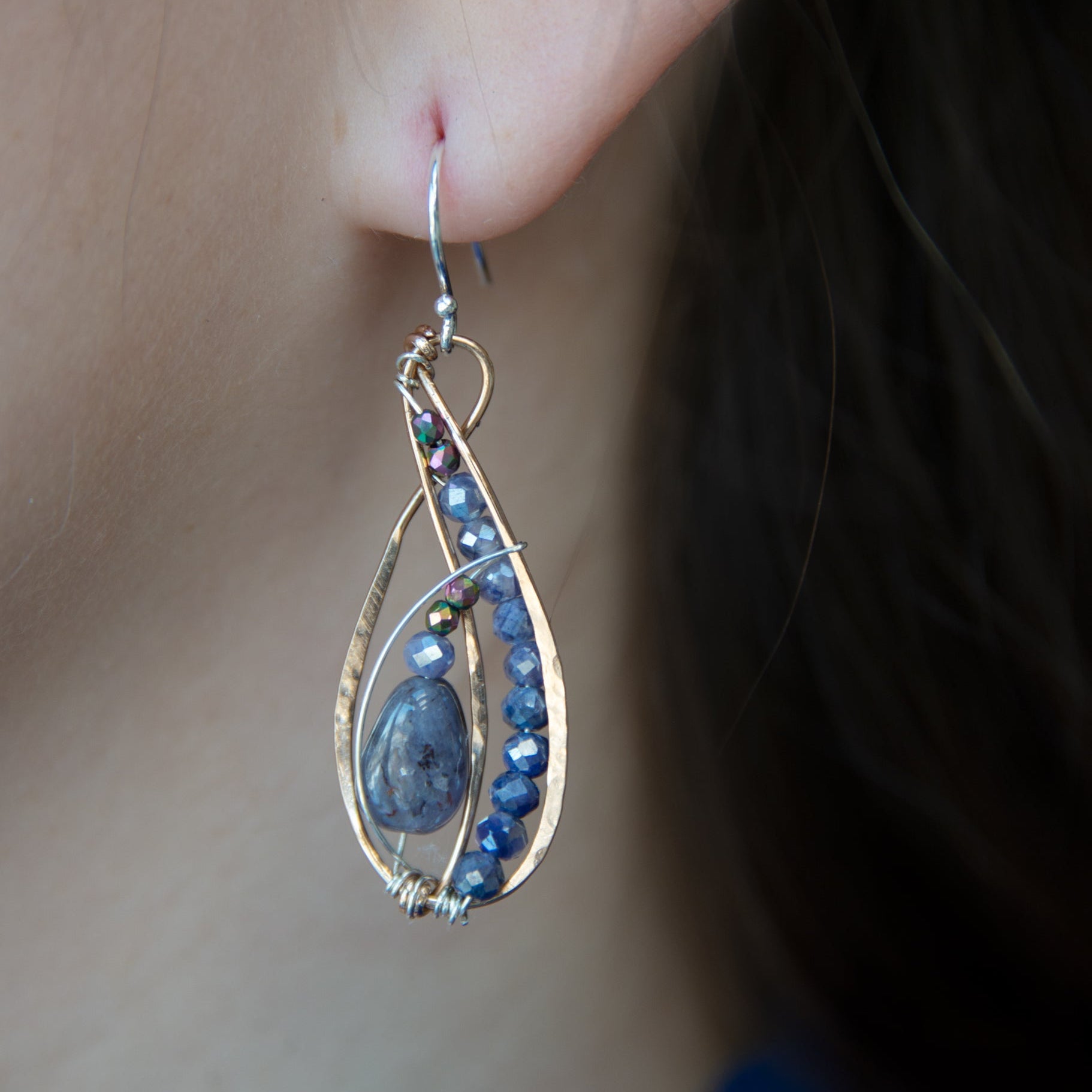 Mini bronze infinity earrings beaded with smooth iolite nuggets, moonstone and crystal on sterling silver wire