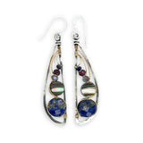 Teardrop-shaped earrings with gemstones on a white background