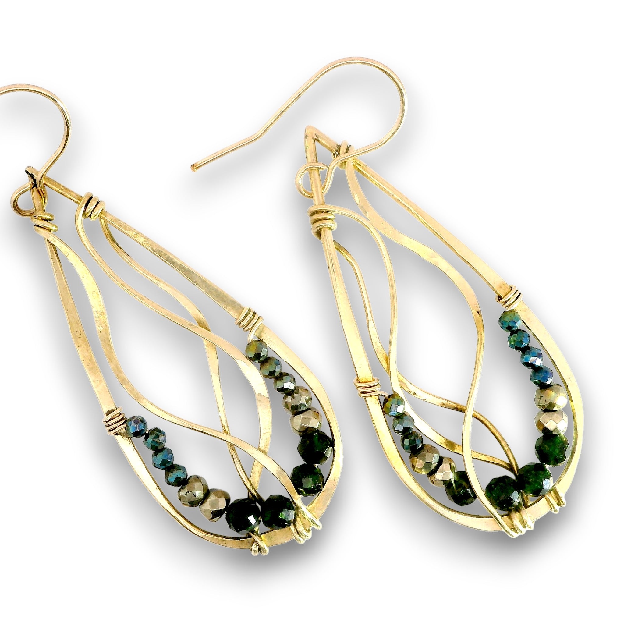 A pair of gold teardrop dangle earrings featuring a wireframe design and a row of faceted beads in dark green, black, and metallic gold, set against a plain white background.