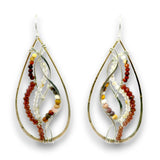 A pair of teardrop-shaped dangle earrings with gold and silver wire frames, decorated with small beads in red, orange, brown, yellow, and white, shown on a white background.