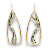 A pair of gold-tone dangle earrings with organic, open teardrop-shaped wire frames, featuring twisted clear fiber and small green, white, and brown bead strands, shown on a white background.