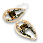 A pair of handmade teardrop-shaped earrings with gold-toned metal frames, dark brown smoky quartz stones, and multi-colored beads including green, white, and orange, shown on a white background.