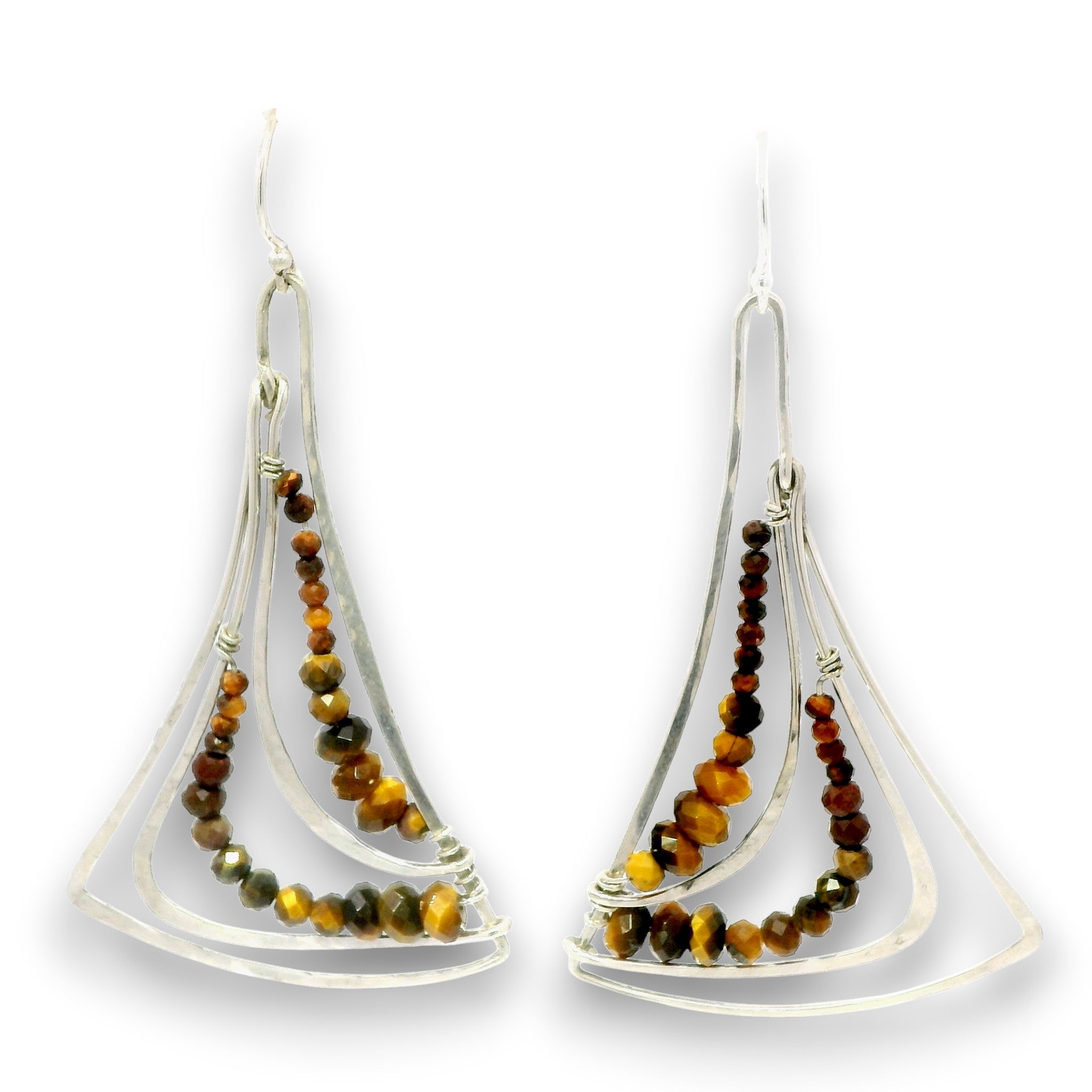 A pair of silver-toned dangle earrings with layered triangular wire frames and rows of small tiger's eye beads in brown, amber, and olive tones, shown on a white background.