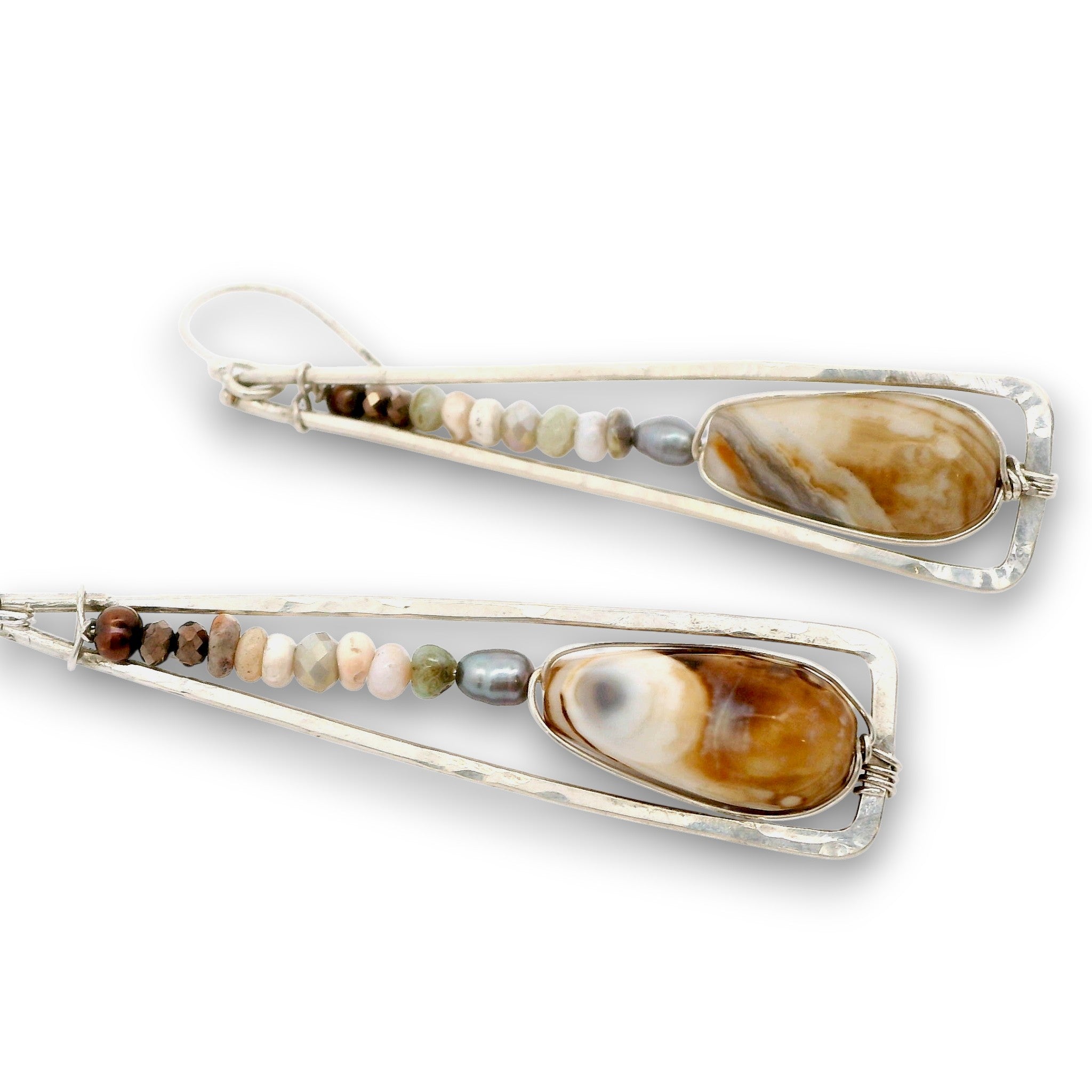A pair of long, triangular silver-toned earrings with small multicolored beads and a large brown and cream marbled stone in each earring, shown on a plain white background.
