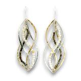 A pair of dangling statement earrings with twisted silver and gold metal bands, accented by strands of white seed beads and small dark brown beads, shown on a white background.