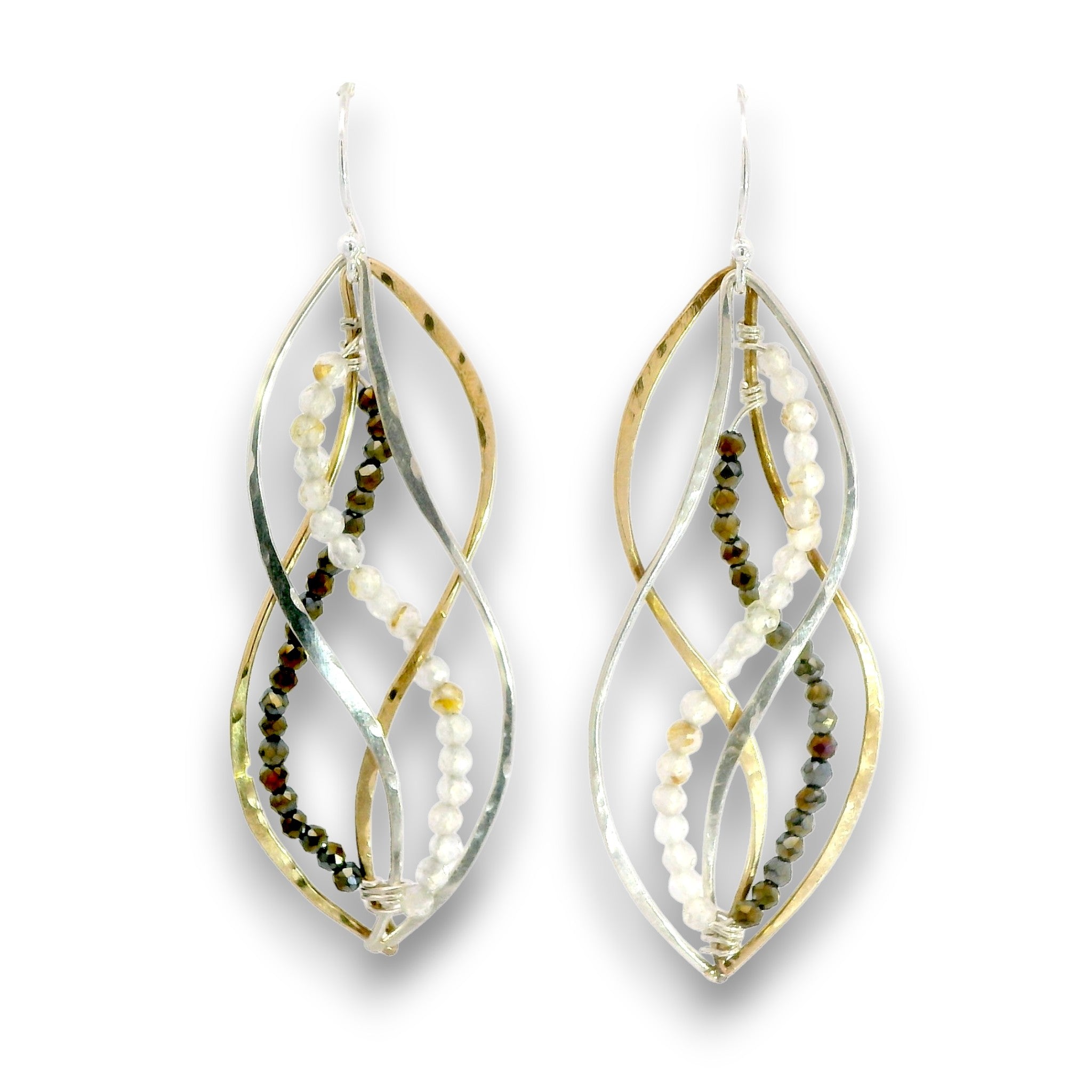 A pair of dangling statement earrings with twisted silver and gold metal bands, accented by strands of white seed beads and small dark brown beads, shown on a white background.