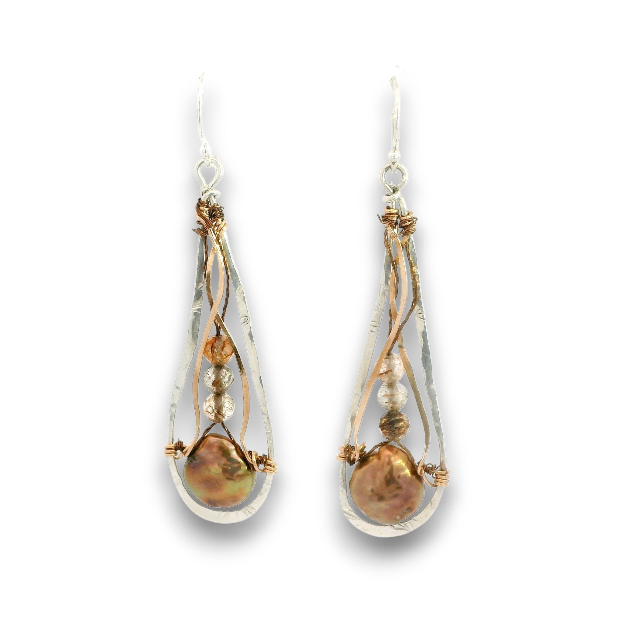A pair of teardrop-shaped dangle earrings featuring iridescent baroque pearls, wrapped in twisted copper wire with small silver beads and silver hooks, shown on a white background.
