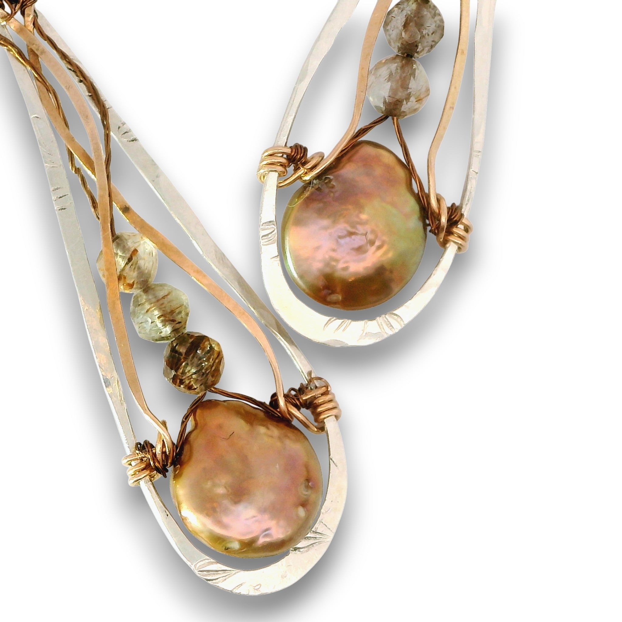 A pair of handmade dangle earrings featuring large, iridescent baroque pearls wrapped in copper wire, suspended from hammered silver-tone metal bars with clear faceted beads, set against a plain white background.