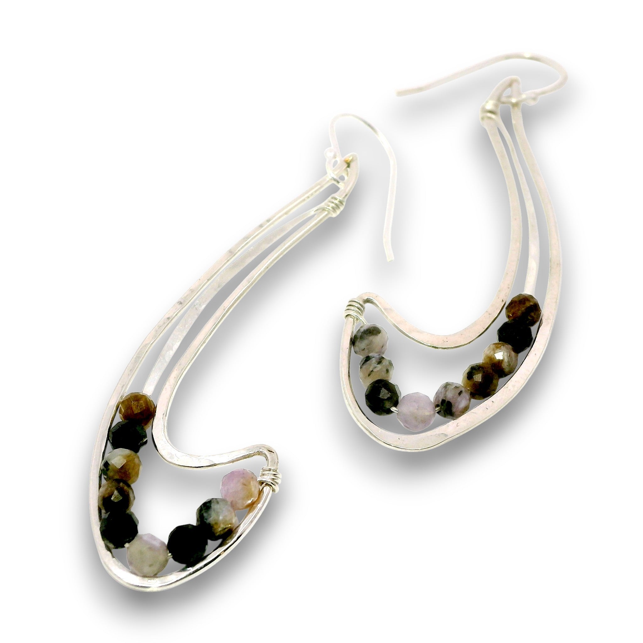 A pair of silver crescent-shaped dangle earrings with small faceted beads in black, brown, and pink, shown on a white background.