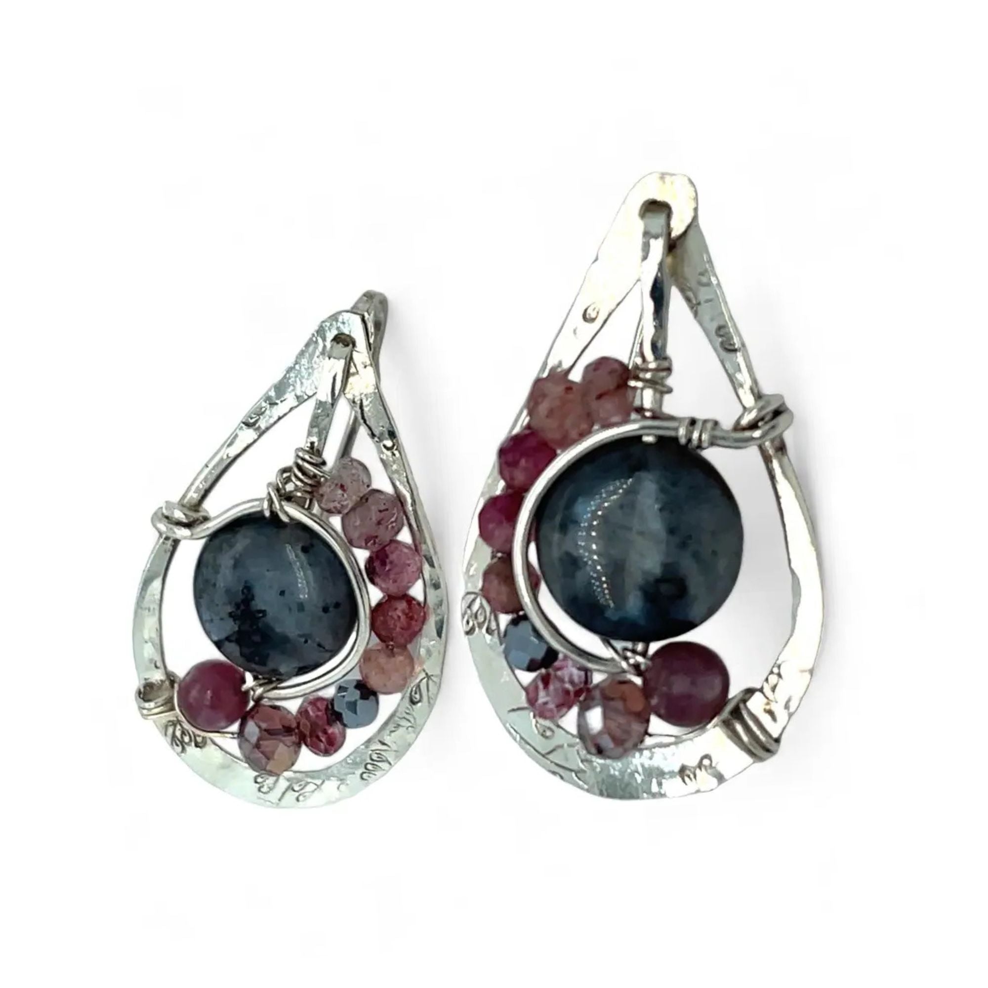 Floral stamped sterling silver drop earrings with larvikite smooth coins surrounded by pink tourmaline, lepidolite, and pyrite gemstones, with a built in earring hook that wears like a post earring