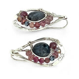 Floral stamped sterling silver drop earrings with larvikite smooth coins surrounded by pink tourmaline, lepidolite, and pyrite gemstones, with a built in earring hook that wears like a post earring