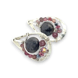 Floral stamped sterling silver drop earrings with larvikite smooth coins surrounded by pink tourmaline, lepidolite, and pyrite gemstones, with a built in earring hook that wears like a post earring