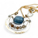 bronze circular pendant with sterling silver accents, london blue quartz square and rutilated quartz gemstones on gold filled chain necklace