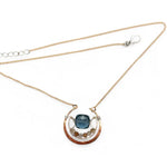 bronze circular pendant with sterling silver accents, london blue quartz square and rutilated quartz gemstones on gold filled chain necklace