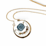 bronze circular pendant with sterling silver accents, london blue quartz square and rutilated quartz gemstones on gold filled chain necklace