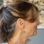 Olive and purple color fresh water pearl collection woven into a gold filled handmade hoop earring