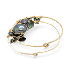 Olive and purple color fresh water pearl collection woven into a gold filled handmade hoop earring