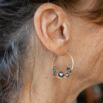 Olive and purple color fresh water pearl collection woven into a gold filled handmade hoop earring