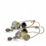 hammered bronze hoop earrings embroidered with a lemon quartz nugget, fresh water pearls, sparkly crystal, and cat's eye gemstones