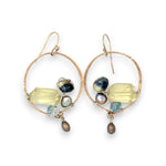 hammered bronze hoop earrings embroidered with a lemon quartz nugget, fresh water pearls, sparkly crystal, and cat's eye gemstones