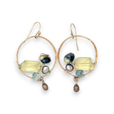 hammered bronze hoop earrings embroidered with a lemon quartz nugget, fresh water pearls, sparkly crystal, and cat's eye gemstones