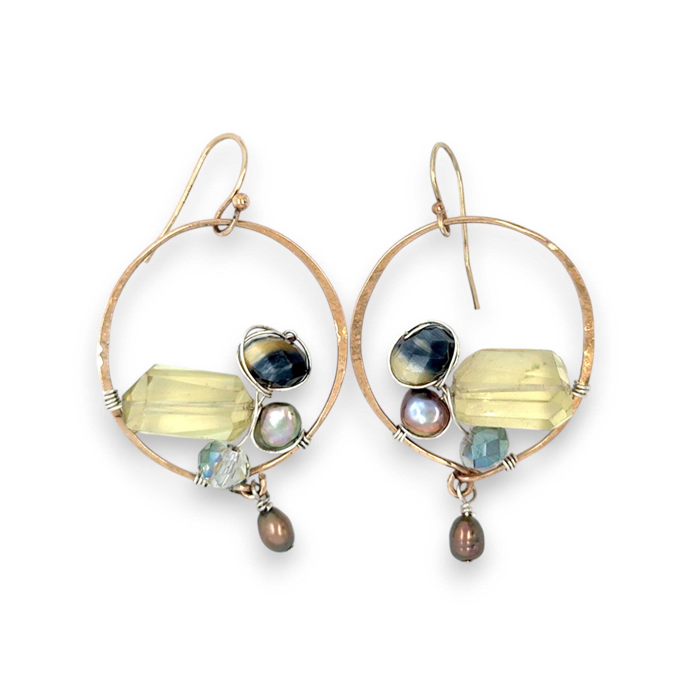 hammered bronze hoop earrings embroidered with a lemon quartz nugget, fresh water pearls, sparkly crystal, and cat's eye gemstones
