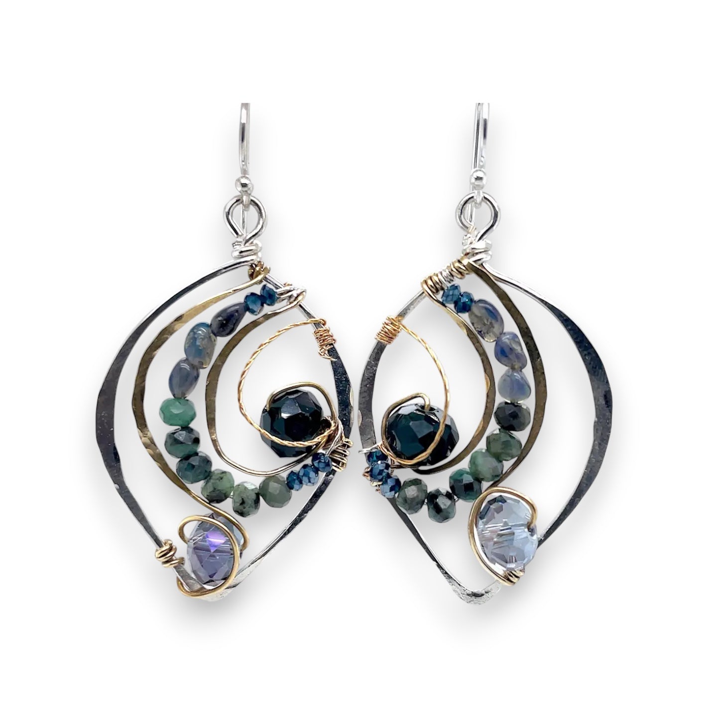 Crystal, emerald, and opal gemstones vein between layers of brass wire inside a sterling silver leaf shaped earring