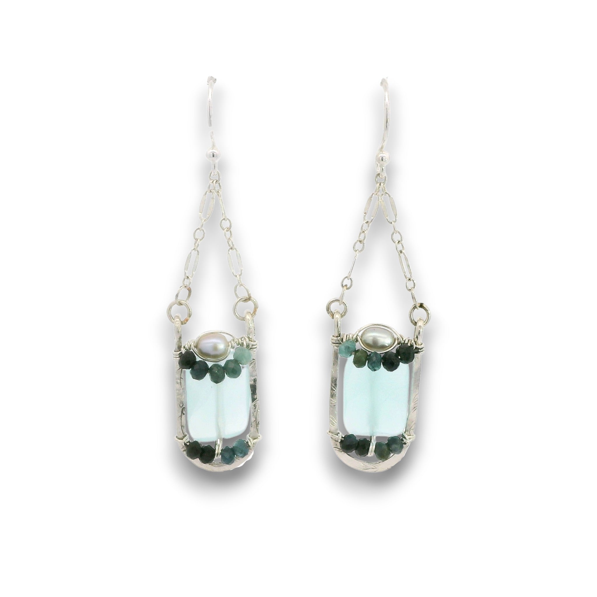 Leaf stamped sterling silver earrings on delicate chain featuring ombre blue tourmaline, fresh water pearl, and chalcedony gemstones