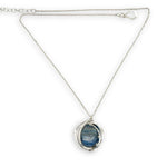 Large smooth oval kyanite gemstones encircled in hammered sterling silver and blue crystal gemstone necklace