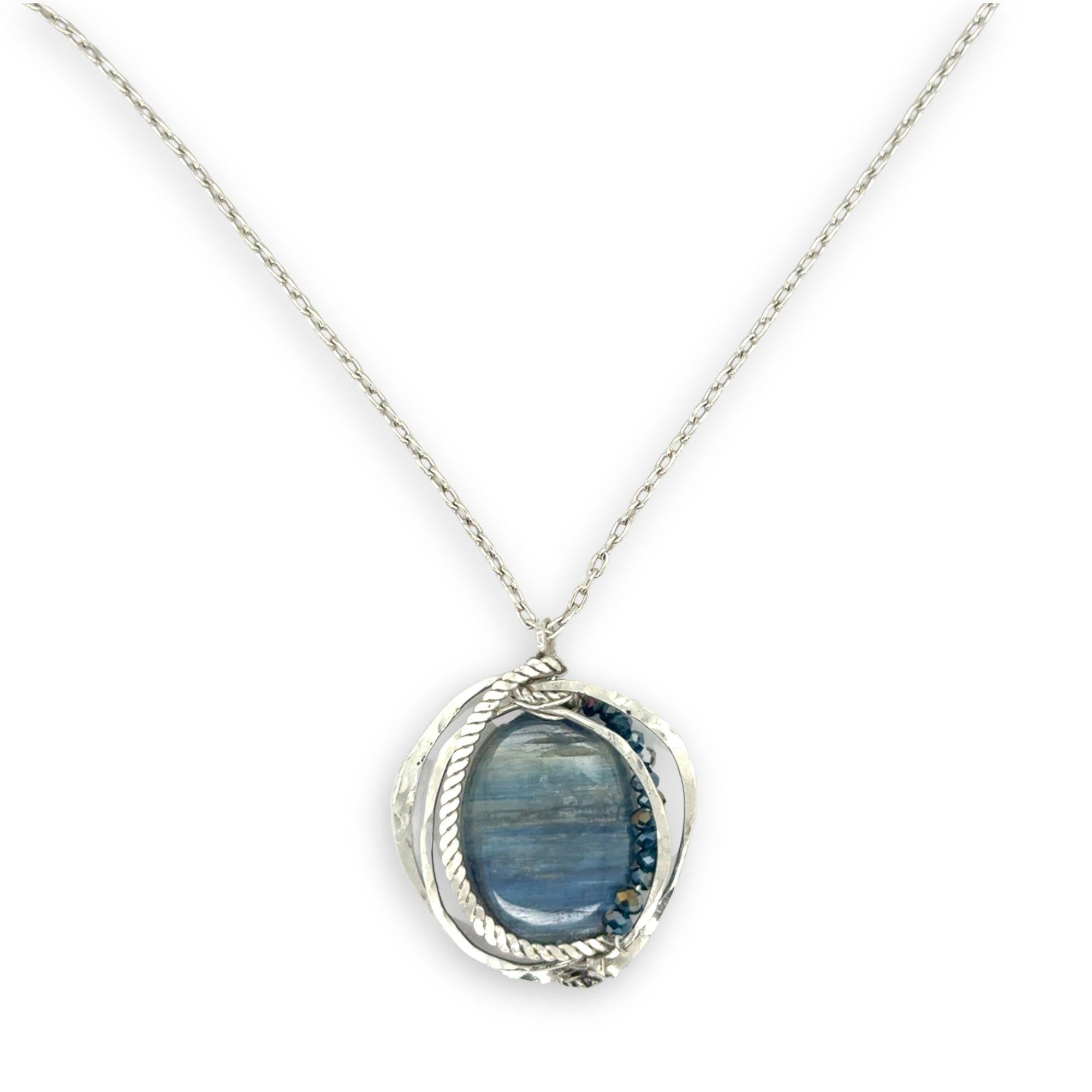 Large smooth oval kyanite gemstones encircled in hammered sterling silver and blue crystal gemstone necklace