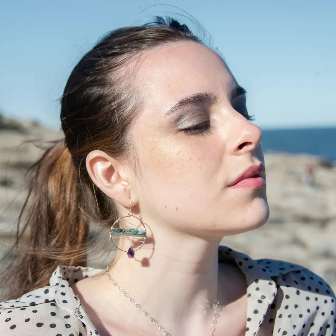 Handmade hammered bronze hoops with amethyst faceted gemstones built in, accented with opal, green amethyst, pyrite, and crystal cubes on sterling silver wire