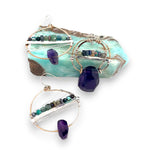 Handmade hammered bronze hoops with amethyst faceted gemstones built in, accented with opal, green amethyst, pyrite, and crystal cubes on sterling silver wire