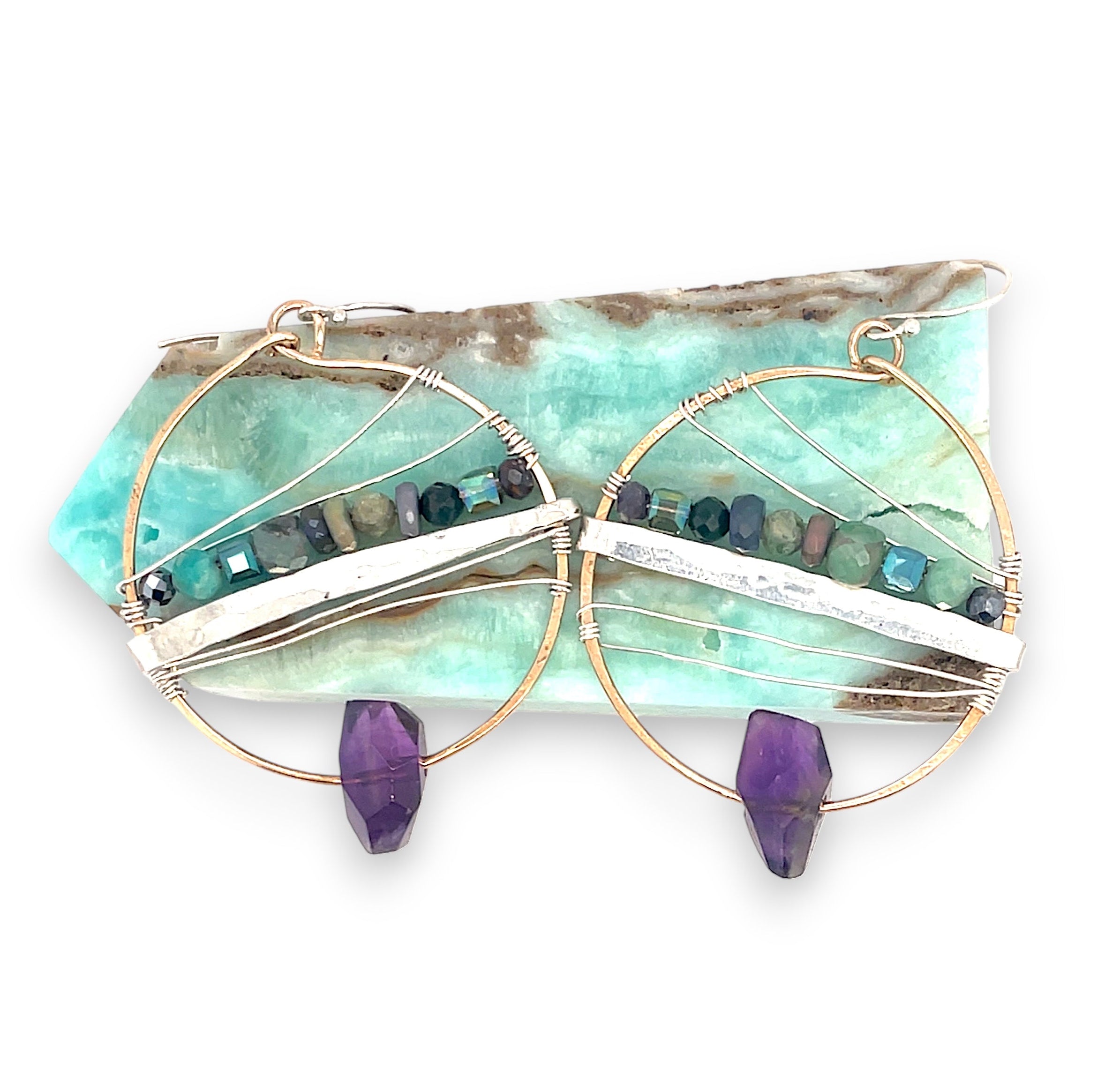 Handmade hammered bronze hoops with amethyst faceted gemstones built in, accented with opal, green amethyst, pyrite, and crystal cubes on sterling silver wire