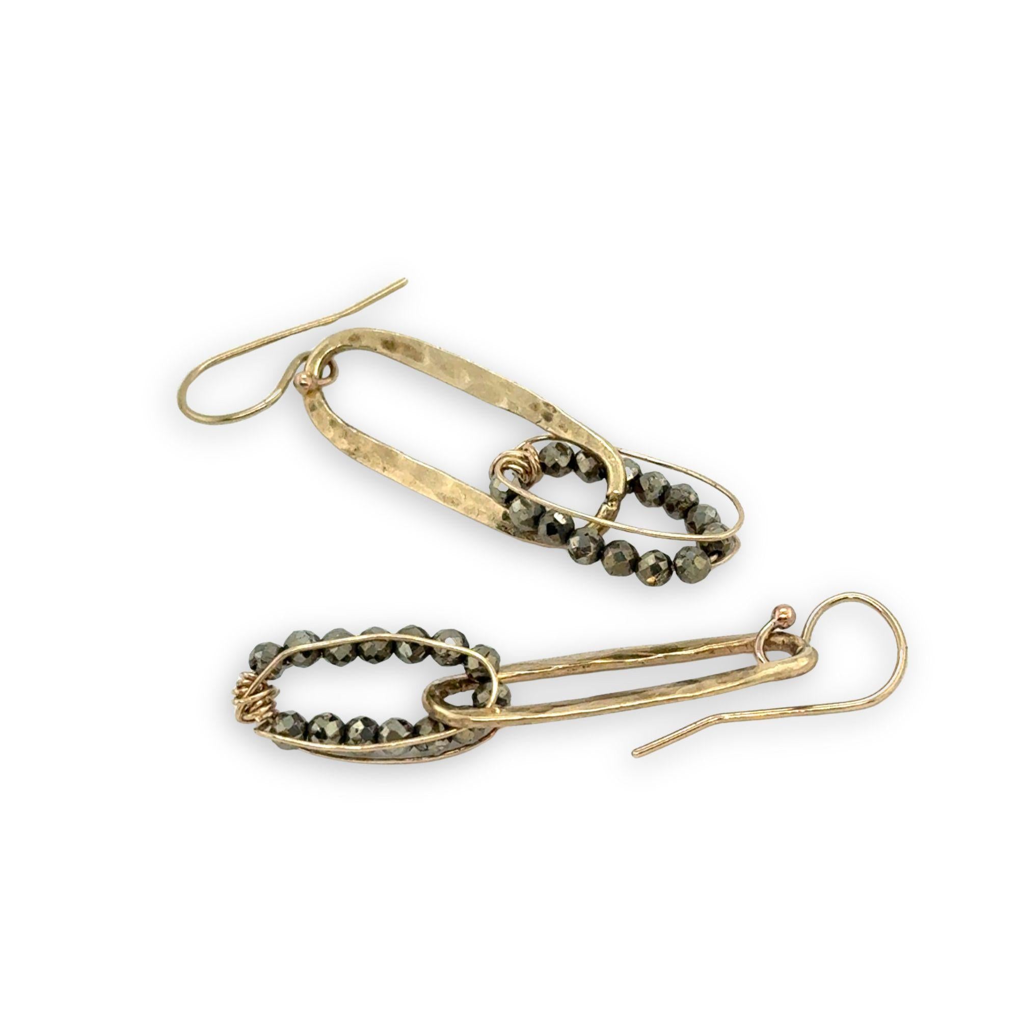 Handmade hammered brass mini oval holding a pyrite loop wrapped in gold filled wire earrings