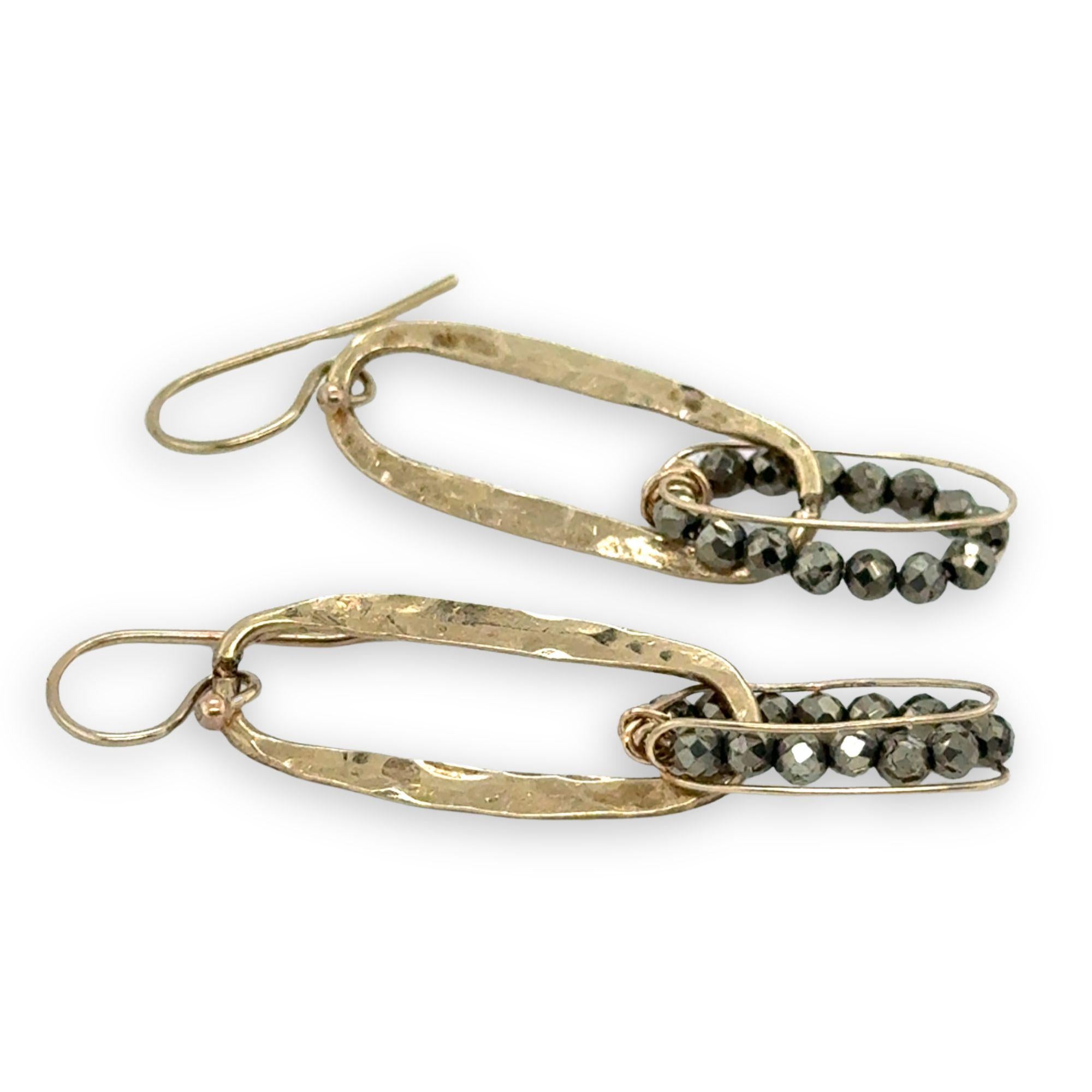 Handmade hammered brass mini oval holding a pyrite loop wrapped in gold filled wire earrings
