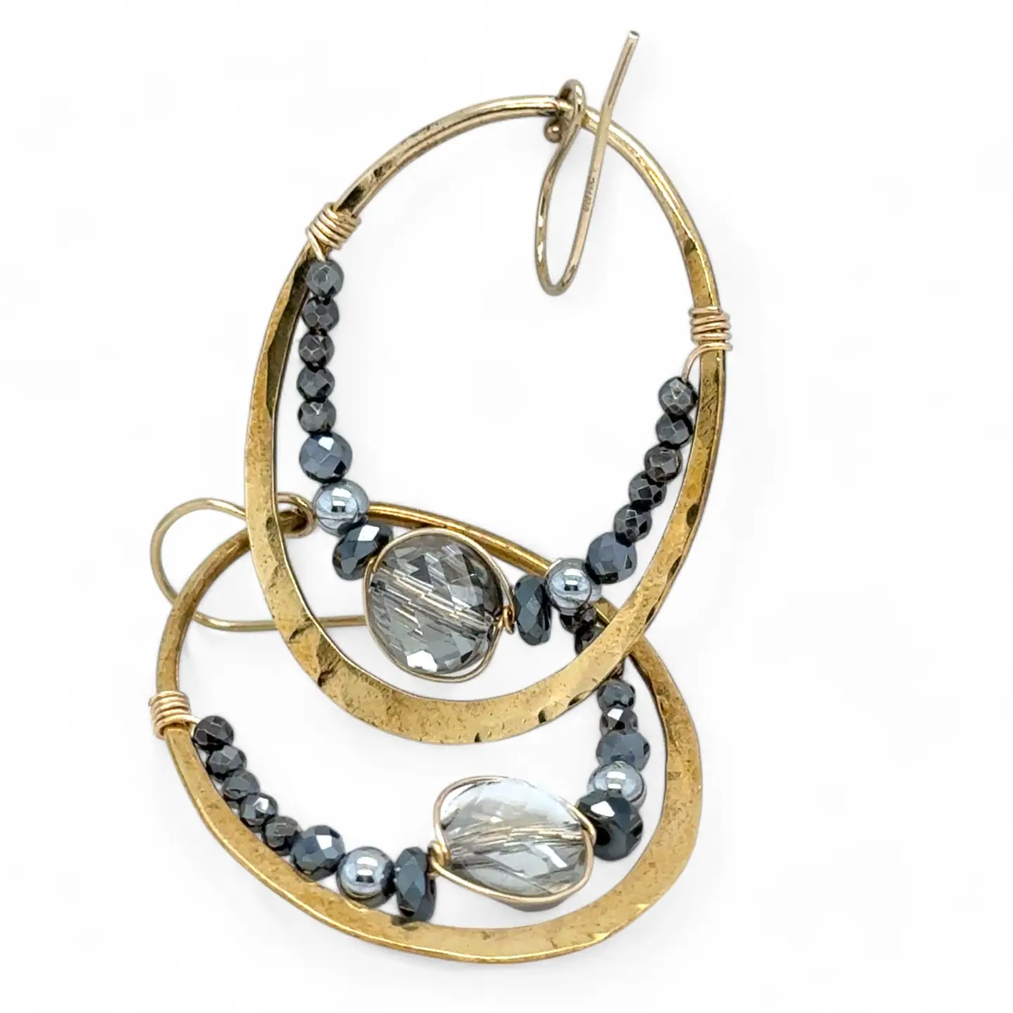 pyrite gemstones mixed with a silver sparkling coin crystal wrapped in gold filled wire inside a brass hammered hoop on gold filled earring hooks