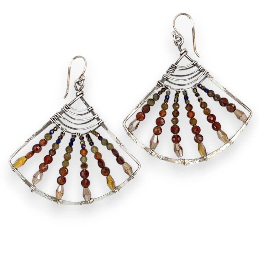 A pair of sterling silver fan earrings with micro faceted hessonite garnet gemstones and crystal