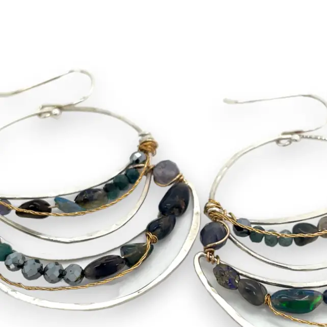 light, sparkly sterling silver hand formed channel hoop earrings with blue opals, blue tourmaline, iolite and pyrite gemstones accented with brass twist wire