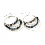 light, sparkly sterling silver hand formed channel hoop earrings with blue opals, blue tourmaline, iolite and pyrite gemstones accented with brass twist wire