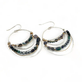 light, sparkly sterling silver hand formed channel hoop earrings with blue opals, blue tourmaline, iolite and pyrite gemstones accented with brass twist wire