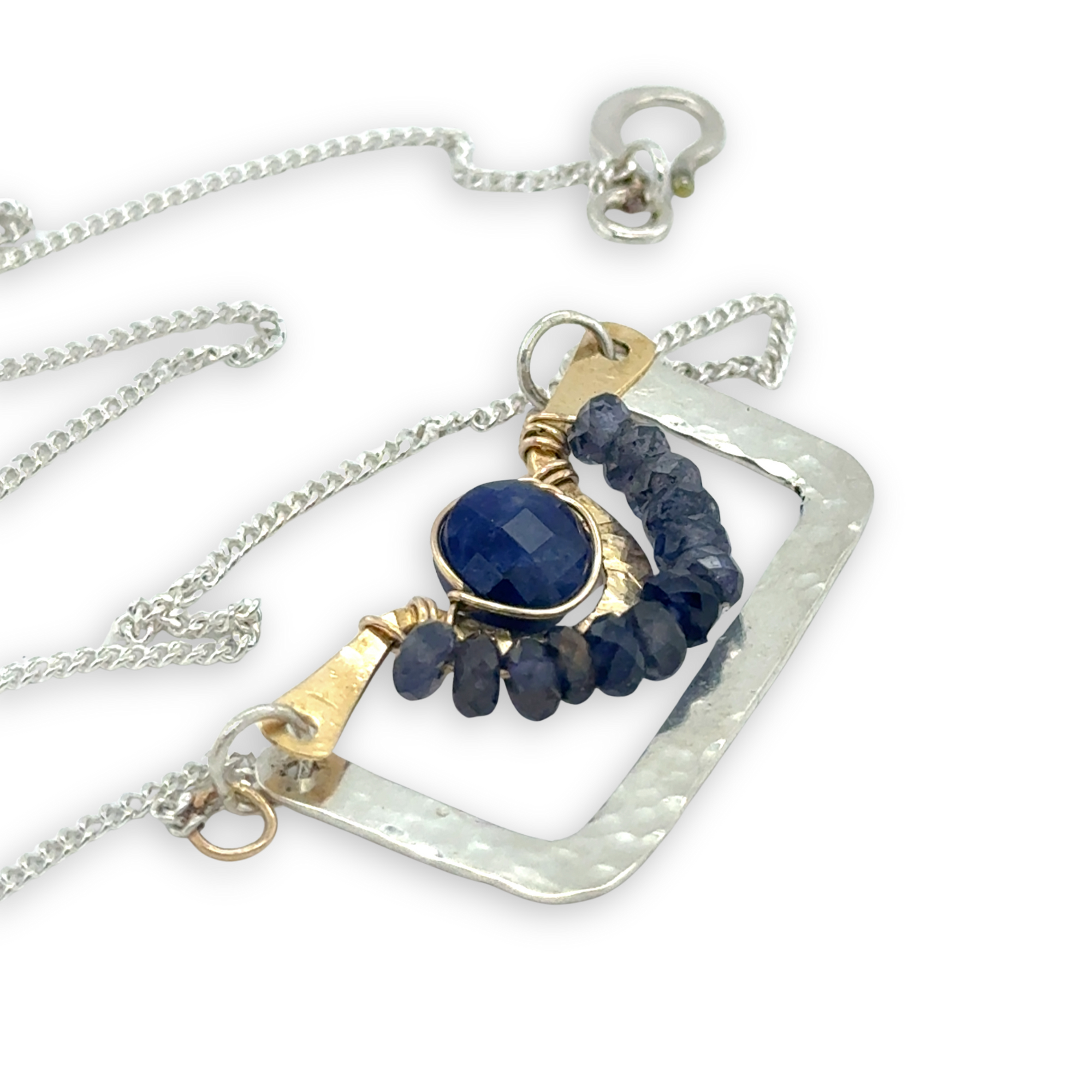 Hammered sterling silver and brass box pendant with iolite and sodalite coin faceted gemstone accents on a sterling silver delicate chain necklace
