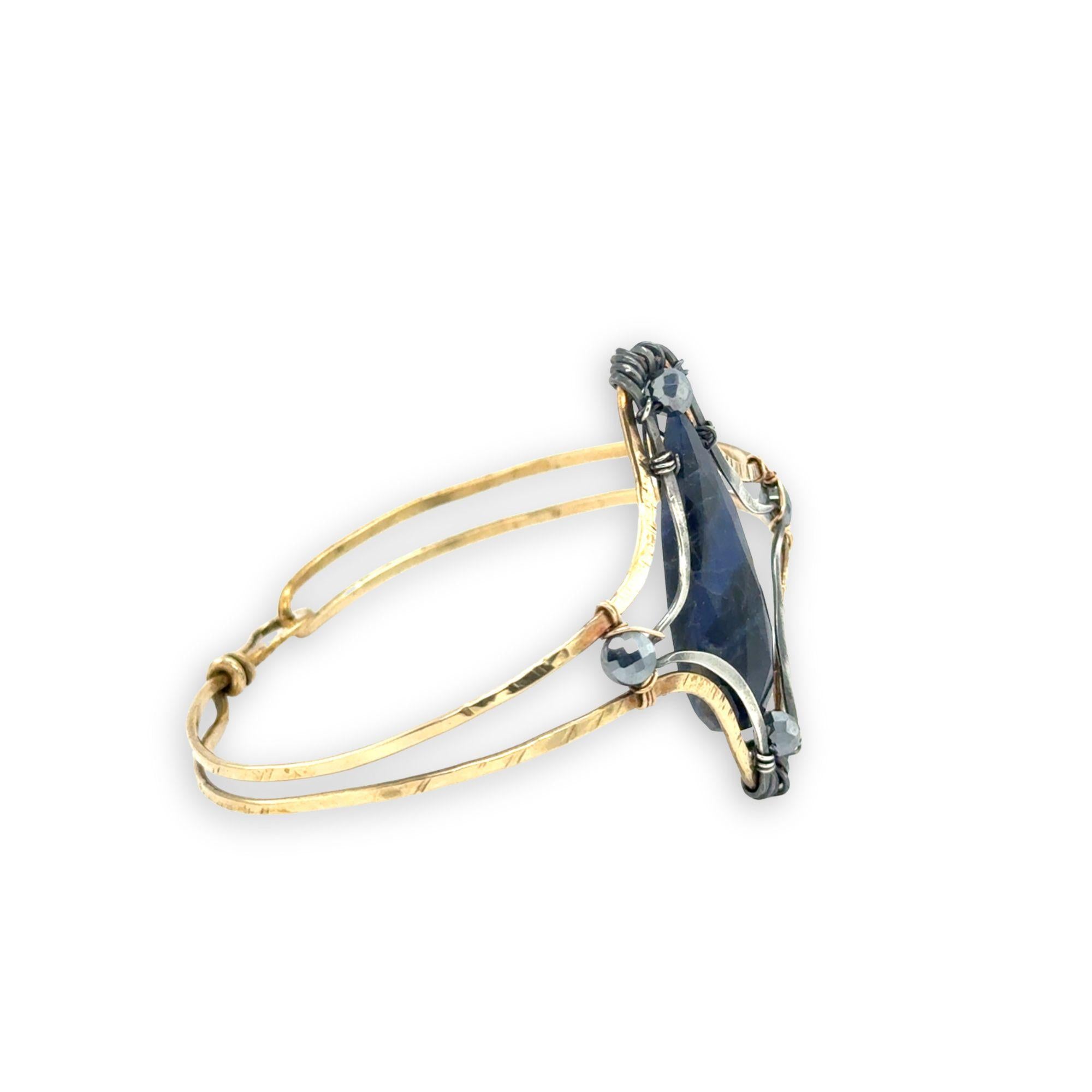 Brass statement cuff bracelet with large sodalite teardrop gemstone with pyrite accents