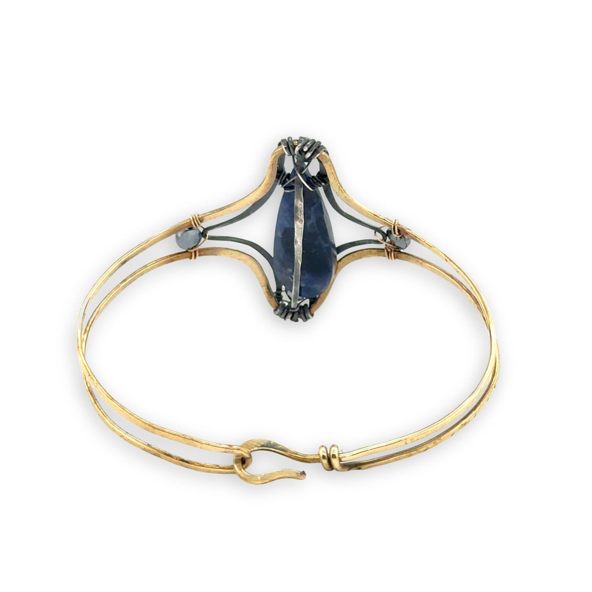 Brass statement cuff bracelet with large sodalite teardrop gemstone with pyrite accents
