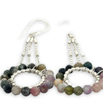 sterling silver dot wire rings surrounded by faceted tourmaline gemstones hanging from sparkly sterling silver delicate chain earrings