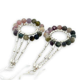 sterling silver dot wire rings surrounded by faceted tourmaline gemstones hanging from sparkly sterling silver delicate chain earrings