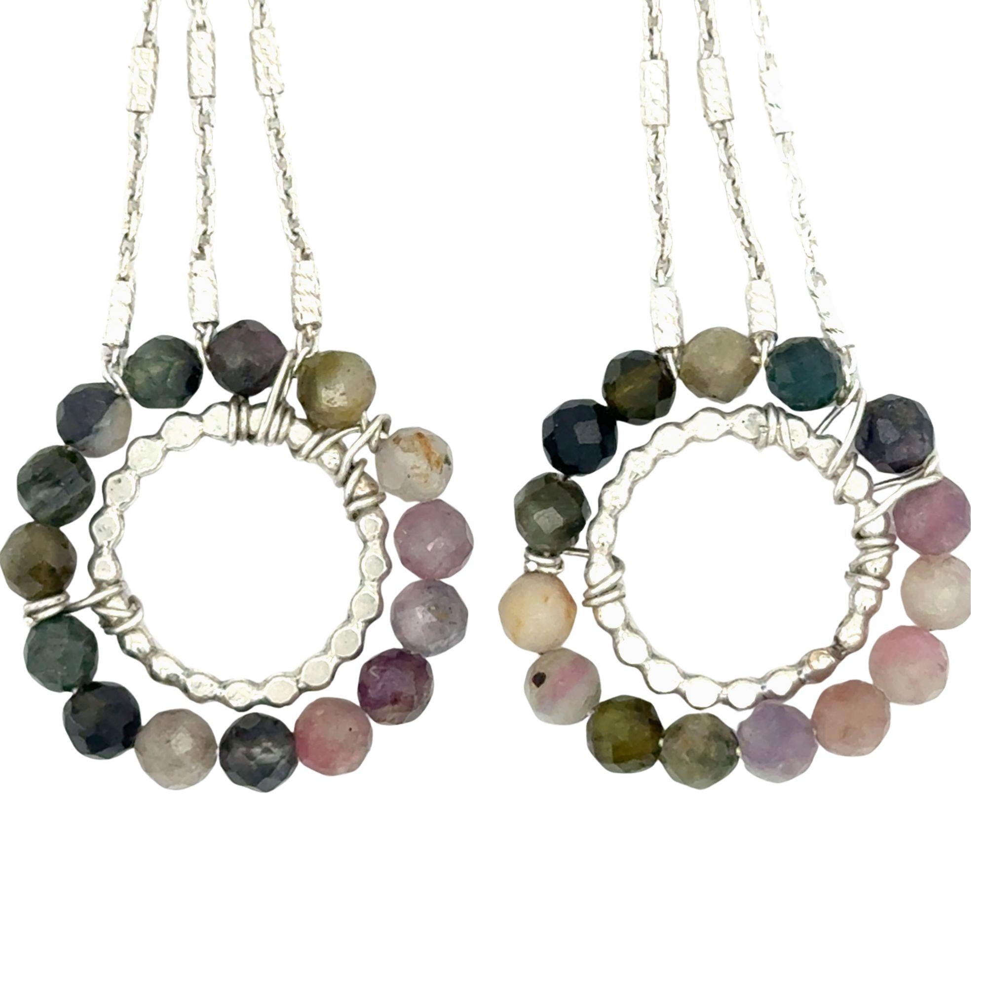 sterling silver dot wire rings surrounded by faceted tourmaline gemstones hanging from sparkly sterling silver delicate chain earrings