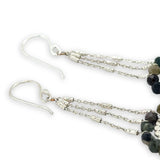 sterling silver dot wire rings surrounded by faceted tourmaline gemstones hanging from sparkly sterling silver delicate chain earrings