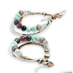 Sterling silver and bronze mini channel drop earrings lined with a mix of moonstone, champagne colored fresh water pearl, tourmaline and  cubic zirconia gemstones