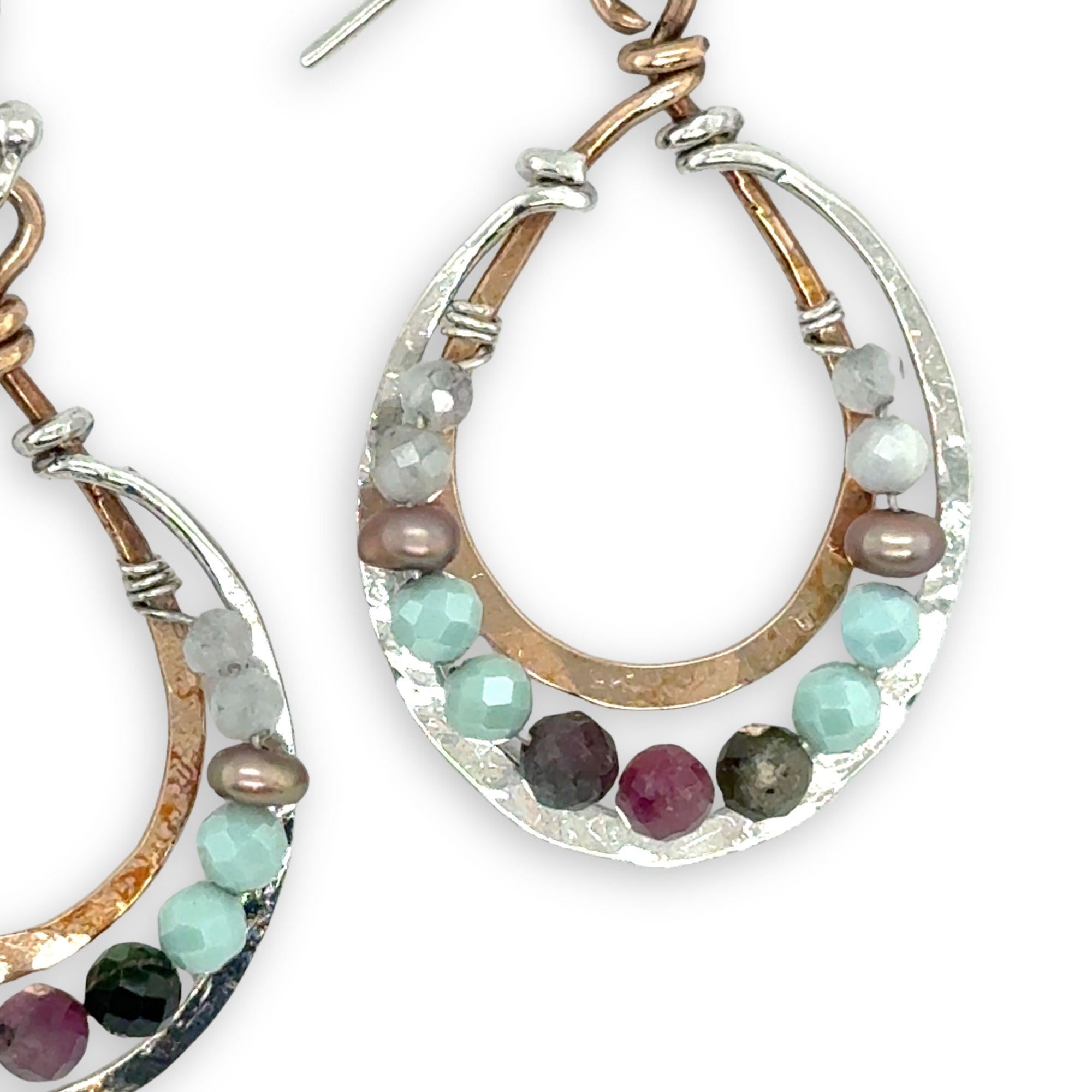 Sterling silver and bronze mini channel drop earrings lined with a mix of moonstone, champagne colored fresh water pearl, tourmaline and  cubic zirconia gemstones